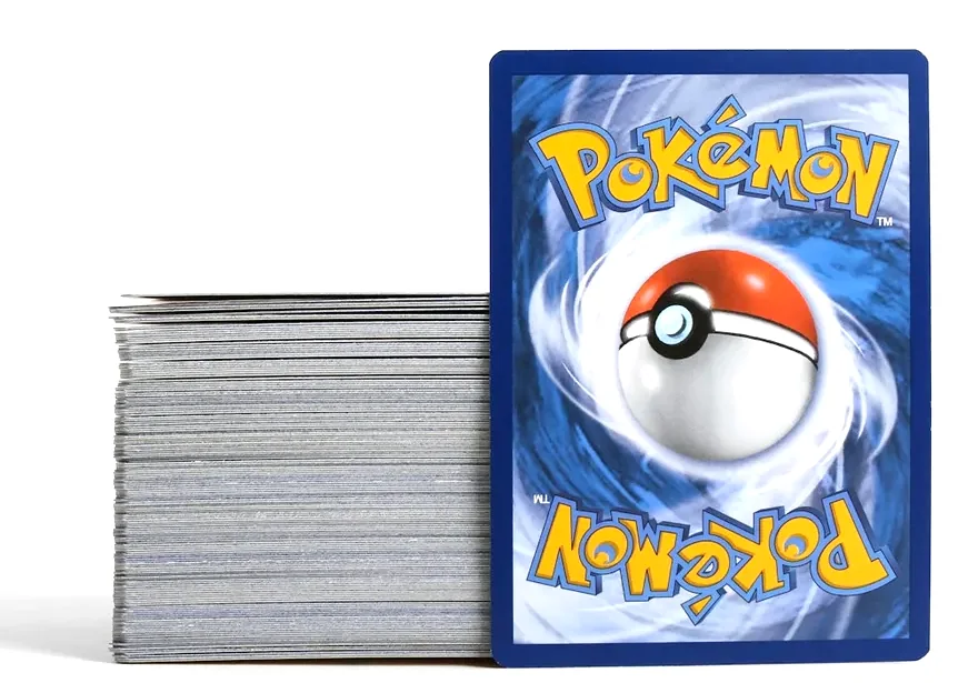 A counted stack of several hundred trading cards next to one card standing upright